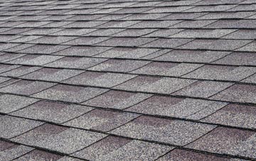 Eaves tiles for shallow pitch roofing